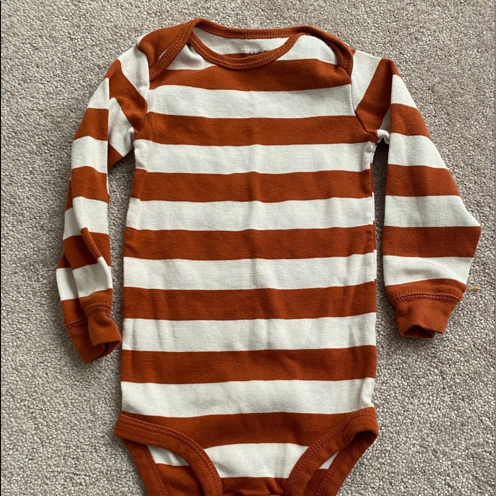 Carter’s 18 month long sleeve onesie with stripes.